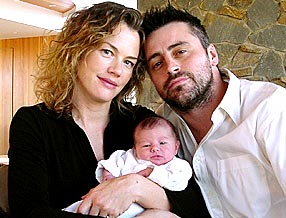 Les heureux parents et la petite Marina